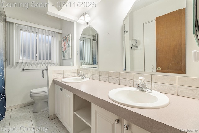 3847 Dwight Dr, Warren, MI 48092 - full bath with double vanity, backsplash, and tile patterned floors