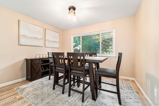 14128 Ellen Dr, Dearborn Heights, MI 48154 - dining area with baseboards and light wood-type flooring