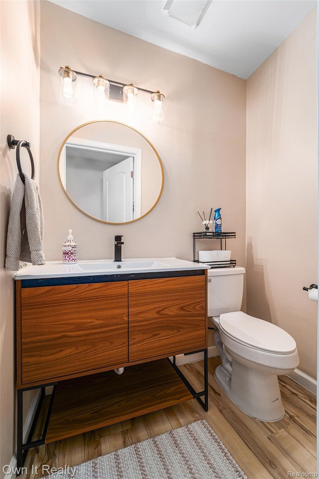 14128 Ellen Dr, Dearborn Heights, MI 48154 - half bath with wood finished floors and vanity