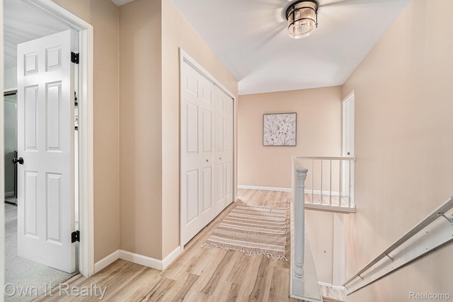 14128 Ellen Dr, Dearborn Heights, MI 48154 - hall featuring light wood-style floors and an upstairs landing