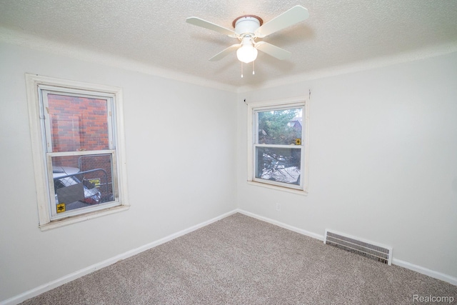 19145 Strasburg St, Detroit, MI 48205 - spare room featuring carpet flooring, ceiling fan, and a textured ceiling
