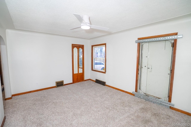 19145 Strasburg St, Detroit, MI 48205 - unfurnished room featuring ceiling fan, carpet flooring, and arched walkways