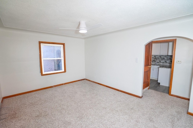 19145 Strasburg St, Detroit, MI 48205 - unfurnished room featuring arched walkways, carpet floors, and ceiling fan