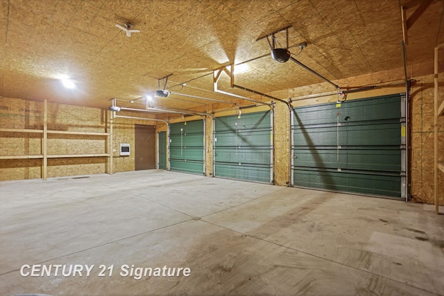 13715 Baldwin Rd, Saginaw, MI 48616 - garage with a garage door opener