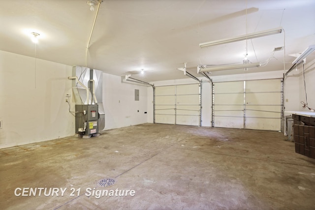 13715 Baldwin Rd, Saginaw, MI 48616 - garage with heating unit and electric panel