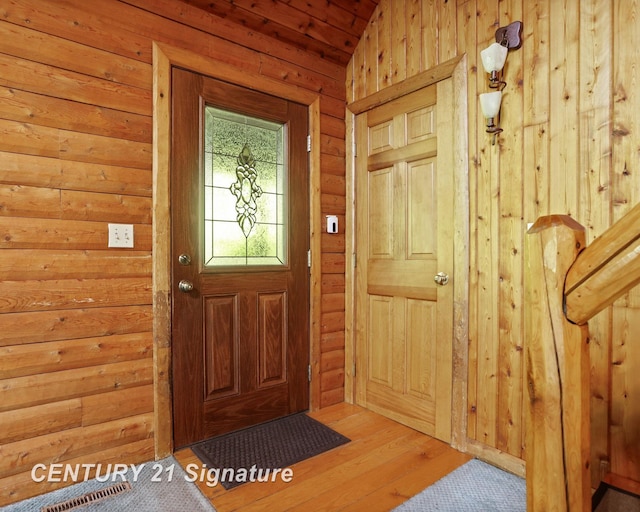 13715 Baldwin Rd, Saginaw, MI 48616 - foyer featuring lofted ceiling and wood finished floors
