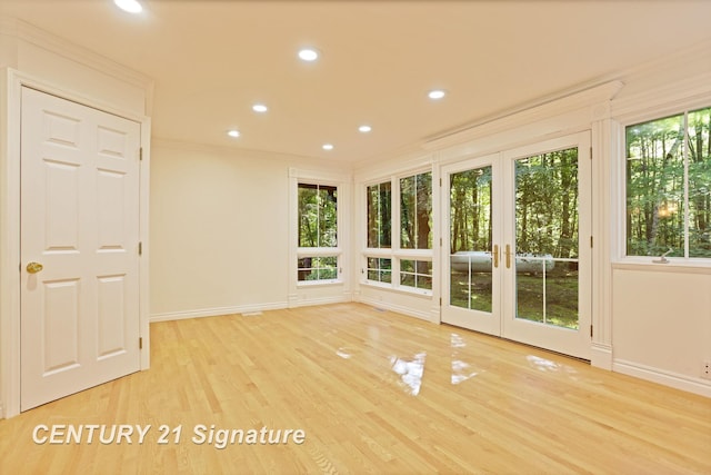 13715 Baldwin Rd, Saginaw, MI 48616 - empty room featuring recessed lighting, wood finished floors, and ornamental molding