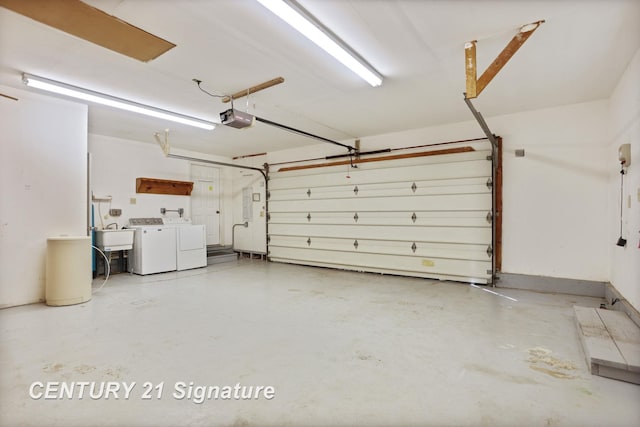 13715 Baldwin Rd, Saginaw, MI 48616 - garage with a garage door opener and washing machine and clothes dryer
