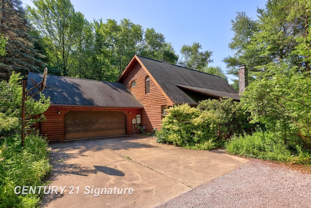 13715 Baldwin Rd, Saginaw, MI 48616 - view of property exterior with driveway, an attached garage, a chimney, log veneer siding, and a shingled roof
