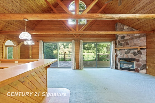 13715 Baldwin Rd, Saginaw, MI 48616 - unfurnished living room with carpet flooring, a wooden ceiling with exposed beams, a fireplace, and high vaulted ceiling