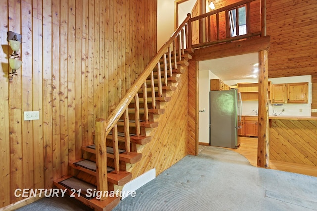 13715 Baldwin Rd, Saginaw, MI 48616 - stairway with carpet floors and wood walls