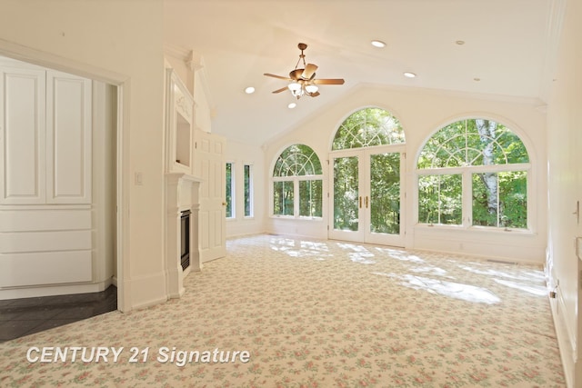 13715 Baldwin Rd, Saginaw, MI 48616 - unfurnished living room with ceiling fan, a glass covered fireplace, recessed lighting, high vaulted ceiling, and carpet