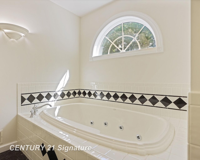 13715 Baldwin Rd, Saginaw, MI 48616 - bathroom with a tub with jets