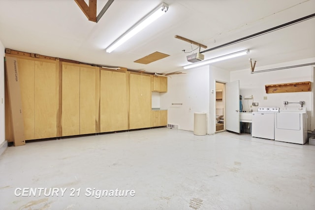 13715 Baldwin Rd, Saginaw, MI 48616 - garage with independent washer and dryer and a garage door opener