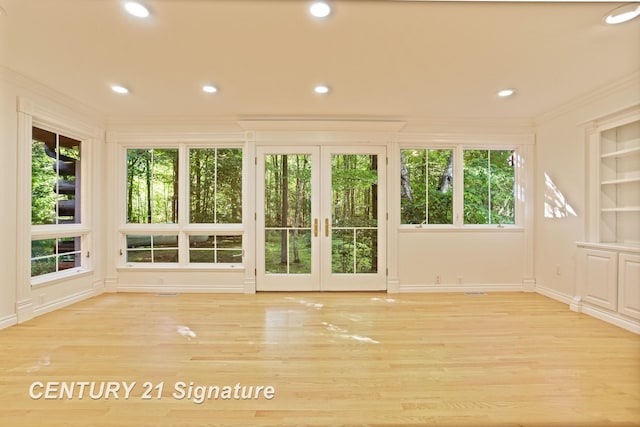 13715 Baldwin Rd, Saginaw, MI 48616 - unfurnished sunroom featuring french doors and healthy amount of natural light