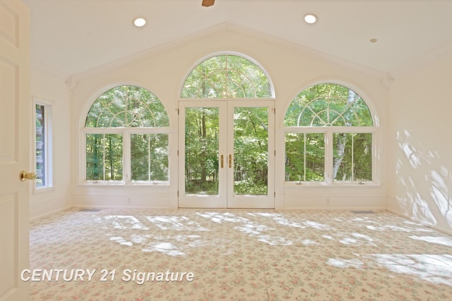 13715 Baldwin Rd, Saginaw, MI 48616 - carpeted empty room featuring lofted ceiling, crown molding, and a ceiling fan