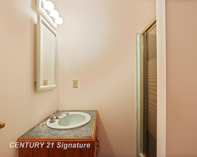 13715 Baldwin Rd, Saginaw, MI 48616 - full bath featuring vanity and an enclosed shower