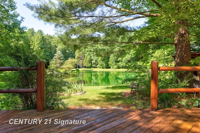 13715 Baldwin Rd, Saginaw, MI 48616 - deck featuring a water view and a wooded view