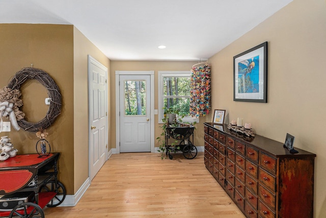 5920 Iris Rd, Ludington, MI 49431 - entrance foyer with light wood-style flooring and recessed lighting