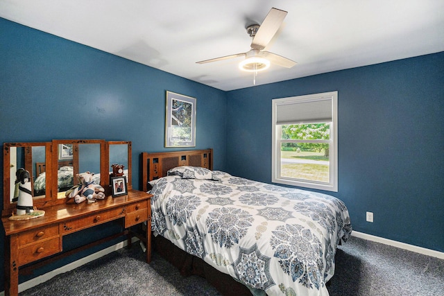 5920 Iris Rd, Ludington, MI 49431 - bedroom with carpet flooring and ceiling fan
