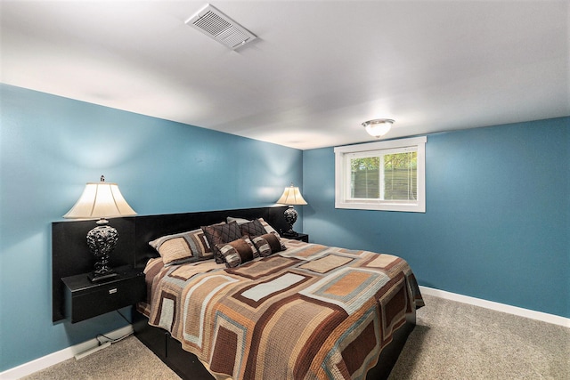 5920 Iris Rd, Ludington, MI 49431 - bedroom featuring baseboards and carpet flooring