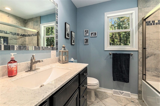 5920 Iris Rd, Ludington, MI 49431 - full bath with vanity and enclosed tub / shower combo
