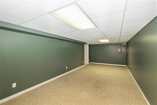 5920 Iris Rd, Ludington, MI 49431 - finished basement featuring carpet floors and a drop ceiling