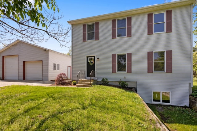 10833 W O Ave, Michigan, MI 49071 - view of front facade with a detached garage, an outdoor structure, a front lawn, and entry steps