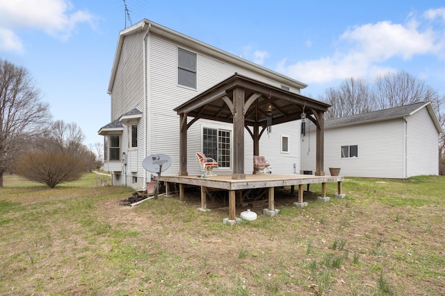 10833 W O Ave, Michigan, MI 49071 - rear view of house featuring a gazebo, a deck, and a lawn