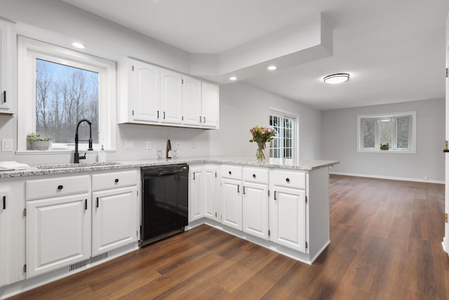 10833 W O Ave, Michigan, MI 49071 - kitchen featuring black dishwasher, a peninsula, recessed lighting, dark wood-style floors, and white cabinetry