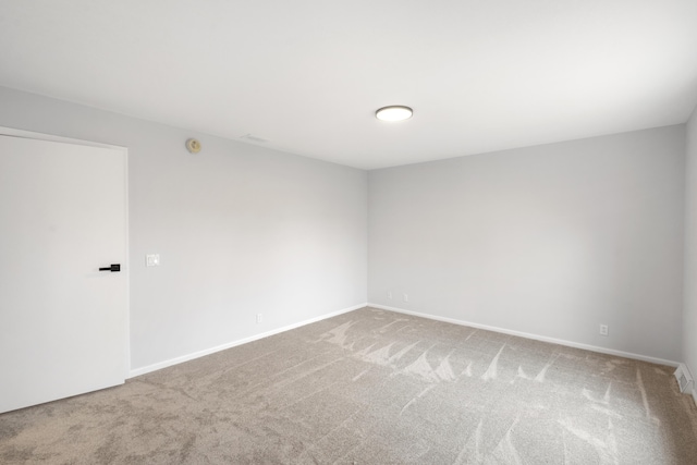 10833 W O Ave, Michigan, MI 49071 - carpeted empty room with baseboards