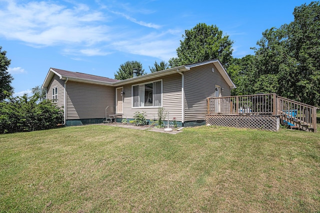 24984 Marcellus Hwy, Dowagiac, MI 49047 - view of side of home with a yard and a deck