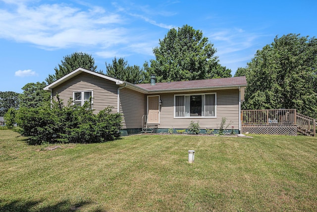 24984 Marcellus Hwy, Dowagiac, MI 49047 - ranch-style home with a front yard and a wooden deck