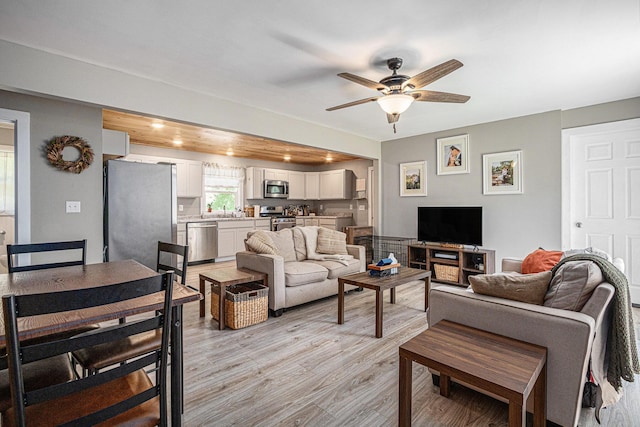 24984 Marcellus Hwy, Dowagiac, MI 49047 - living area with light wood finished floors and ceiling fan