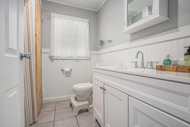 24984 Marcellus Hwy, Dowagiac, MI 49047 - bathroom with vanity, tile patterned flooring, and wainscoting