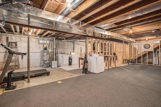 24984 Marcellus Hwy, Dowagiac, MI 49047 - unfinished below grade area featuring water heater, washing machine and dryer, and stairway