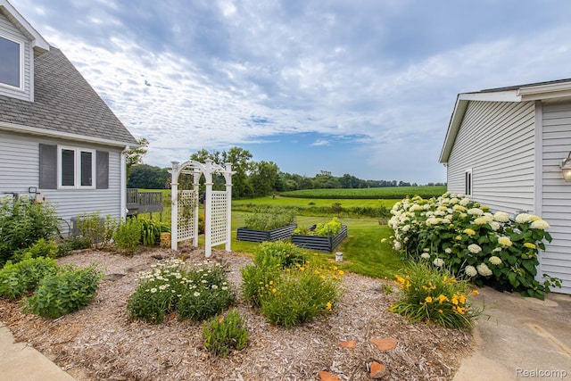 2086 Haines Rd, Lapeer, MI 48446 - view of yard featuring a garden