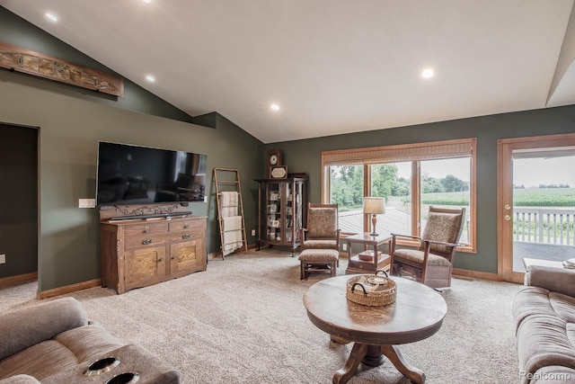 2086 Haines Rd, Lapeer, MI 48446 - living area featuring lofted ceiling, light carpet, recessed lighting, and plenty of natural light