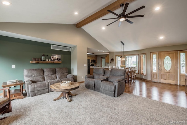 2086 Haines Rd, Lapeer, MI 48446 - carpeted living area featuring ceiling fan, beamed ceiling, recessed lighting, high vaulted ceiling, and wood finished floors