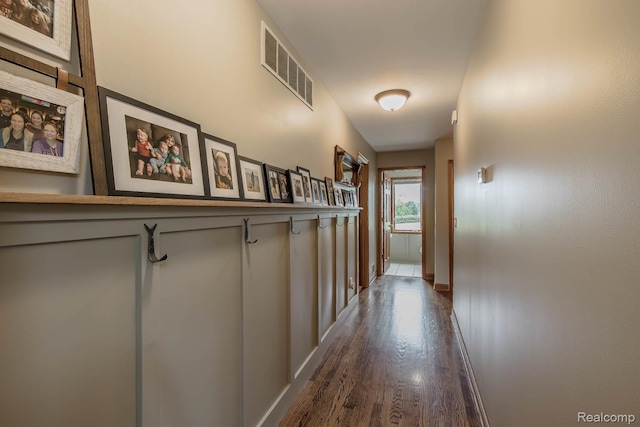 2086 Haines Rd, Lapeer, MI 48446 - hall featuring dark wood-style flooring and baseboards