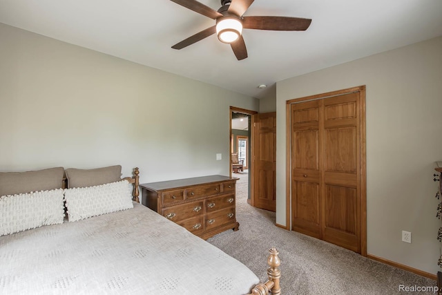 2086 Haines Rd, Lapeer, MI 48446 - bedroom with light colored carpet, a closet, and a ceiling fan
