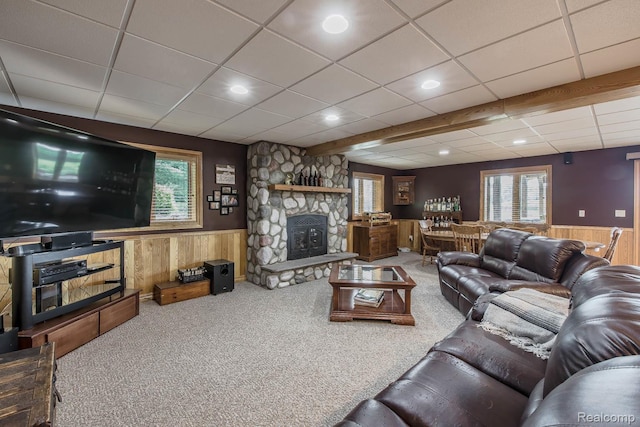 2086 Haines Rd, Lapeer, MI 48446 - living area with a wainscoted wall, wood walls, carpet, healthy amount of natural light, and a paneled ceiling