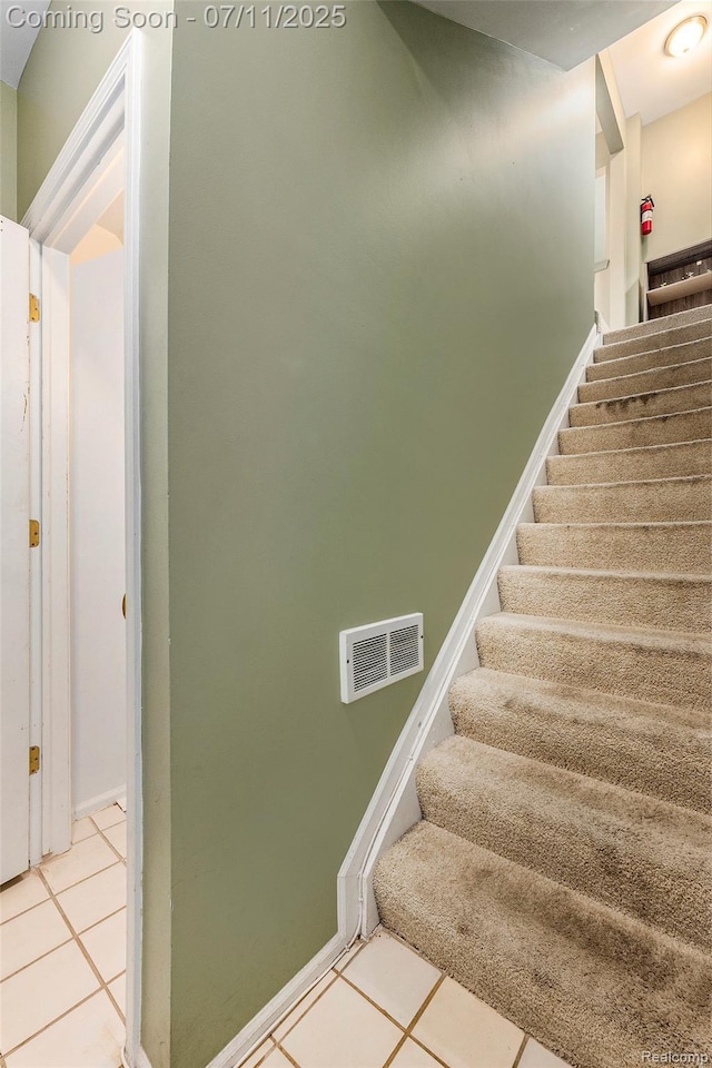 41455 Clinton Grove Dr, Clinton Township, MI 48038 - stairway with tile patterned floors and baseboards