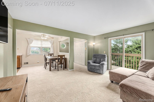 41455 Clinton Grove Dr, Clinton Township, MI 48038 - living area with light carpet and a ceiling fan