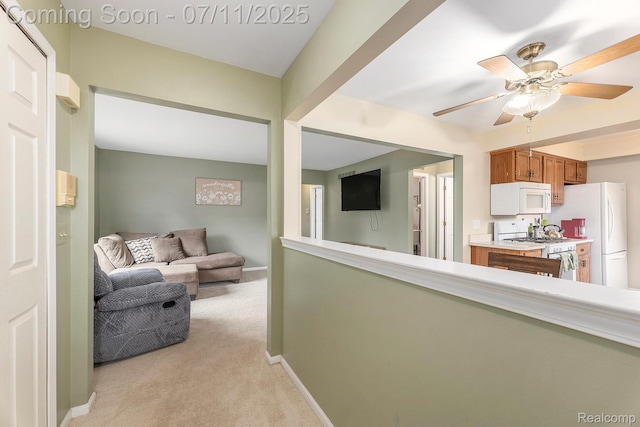 41455 Clinton Grove Dr, Clinton Township, MI 48038 - living area with light carpet and ceiling fan