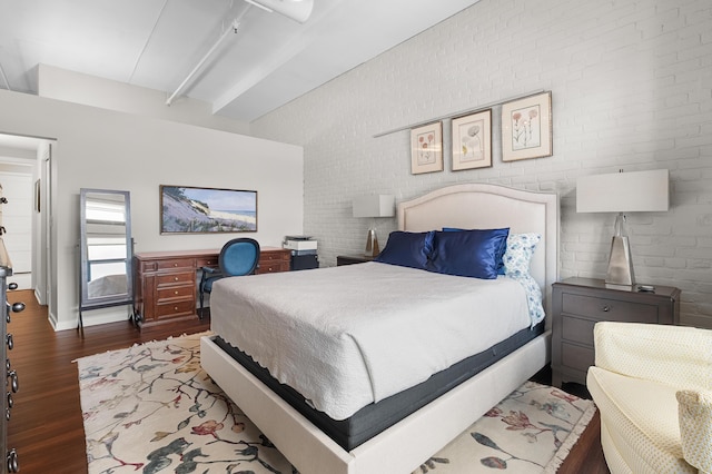 125 S Kalamazoo Mall Unit 603, Kalamazoo, MI 49007 - bedroom with dark wood-style flooring and beam ceiling