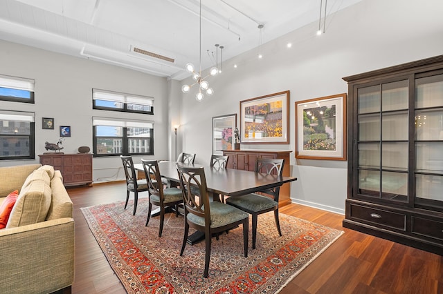 125 S Kalamazoo Mall Unit 603, Kalamazoo, MI 49007 - dining room with a towering ceiling and wood finished floors