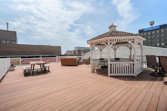 125 S Kalamazoo Mall Unit 603, Kalamazoo, MI 49007 - wooden deck featuring outdoor dining space, a gazebo, and outdoor lounge area