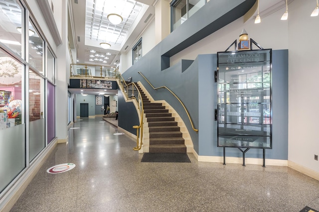 125 S Kalamazoo Mall Unit 603, Kalamazoo, MI 49007 - common area featuring a towering ceiling and stairs
