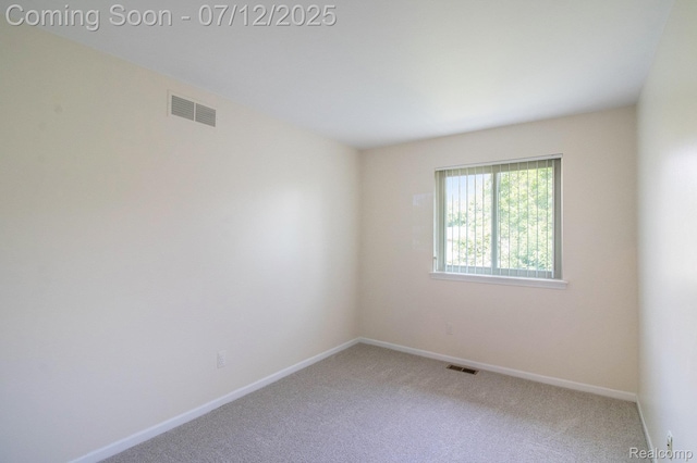 7924 Meadow Dr, Waterford, MI 48329 - carpeted empty room with baseboards